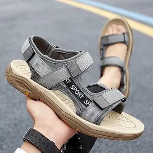 Detailed view of men's outdoor sport sandals, breathable strap design and durable sole.