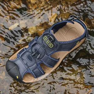 Detail view of men's outdoor casual sandals, durable blue straps and protective toe design.