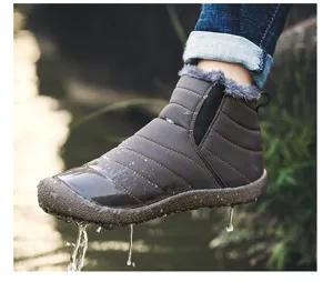 Waterproof winter snow boots with plush lining, outdoor casual warm footwear detail.