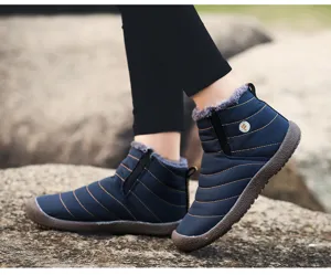 Detail view of winter snow boots with plush lining and waterproof upper for outdoor casual wear.