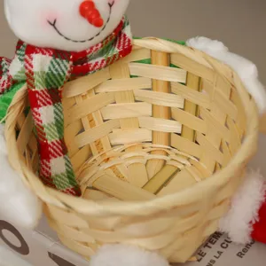 Christmas bamboo woven basket with cute snowman plush doll for desktop holiday decoration storage.