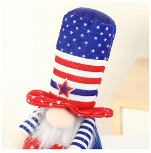Patriotic gnome detail, American flag star hat plush doll ornament, festive indoor holiday decor.