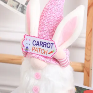 Easter bunny gnome plush doll with pink hat and cute ears, perfect desktop holiday decor.