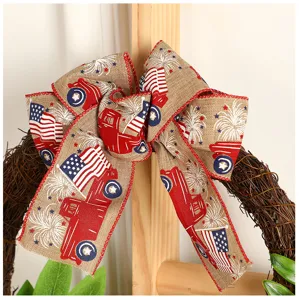 Independence Day burlap bow wreath with red truck and American flag print for door decor.