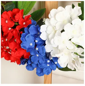 Close-up detail of red white and blue artificial hydrangea wreath for US holiday decor.
