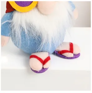 Detail close-up of summer gnome plush toy feet and beard, cute Hawaiian faceless doll.