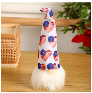 Independence day faceless gnome plush doll with American flag heart hat for holiday decor.