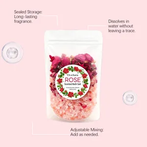 Close-up detail of OceAura rose scented bath salt pouch showing natural floral petals inside.