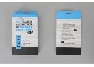 Pet grooming rake comb packaging box showing double row pins and professional care features.