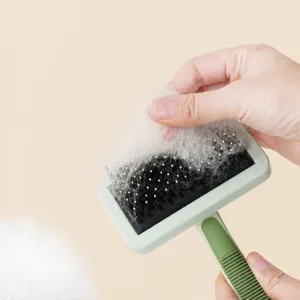 Pet slicker brush for dogs and cats, ideal for removing loose fur and untangling mats gently.