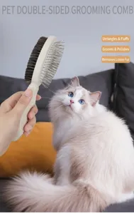 Detail view of pet double sided grooming comb with steel pins and soft bristles for cat care.