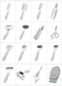 White grey pet grooming tool set detail view featuring various cat and dog combs and scissors.