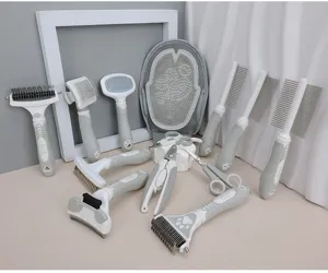 Pet grooming brush set in white and gray, multi-functional deshedding tools for dogs and cats.
