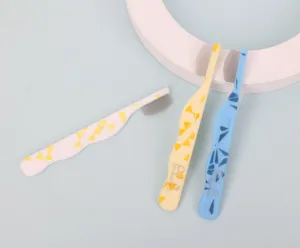 Mini pet face comb set with fine metal teeth and colorful patterned handles for grooming cats and dogs.