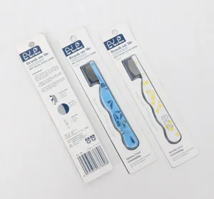 Mini pet face comb for dogs and cats, gentle eye grooming tool with hanging card packaging.