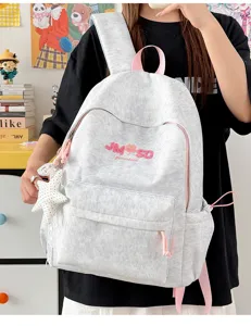Mochila escolar casual elegante de gran capacidad mochila diaria para estudiantes con lindos dijes