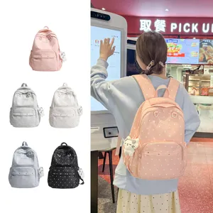Sac à dos d'école mignon à pois pour femmes et ados, sac de voyage décontracté avec pendentif.