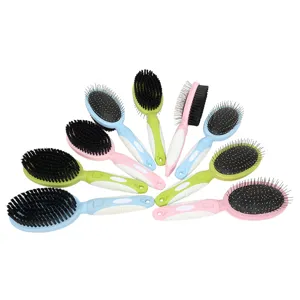 Pet double-sided grooming brush for dogs and cats, featuring pin brush and bristle sides.