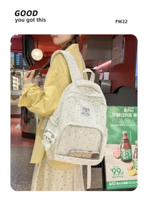Zaino ita a pois bianchi in stile coreano con tasca frontale trasparente e ciondolo.