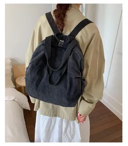 Sac à dos en denim lavé vintage pour femme, sac de jour décontracté et multifonctionnel spacieux.