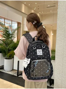 Zaino in tela a pois neri con tasca frontale trasparente, carinissima borsa casual per la scuola.