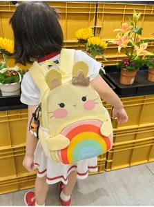 Cute kids bunny backpack with rainbow design, vibrant yellow school bag for toddlers 3-6 years.