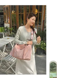 Gran bolsa de viaje para mujer, bolso de hombro cruzado rosa ligero para fitness, viajes y uso diario.