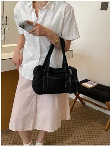 Vintage washed canvas women shoulder tote bag casual commuter underarm handbag with mini pouch.
