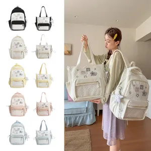 Japanischer ins Stil süßer gepunkteter Rucksack und Tragetaschen Set für Schüler.