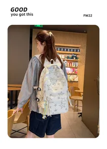Detail view of a Japanese casual school backpack with trendy star print design.