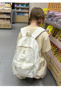 Süßer Schulrucksack mit Ahornblatt-Druck und Plüschanhänger, großer lässiger Tagesrucksack.