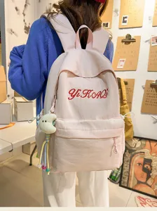Lockerer minimalistischer rosa Schulrucksack für Jugendliche und Studenten, leicht und praktisch.