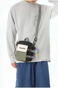 Sac bandoulière colorblock stylé pour les déplacements, sac messager en toile décontracté.