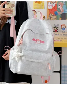 Mochila escolar de gran capacidad para estudiantes con correas rosas y bordado de trébol.