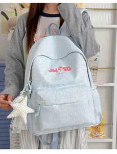 Moderna mochila escolar casual de gran capacidad para niñas, elegante diseño con letras bordadas.