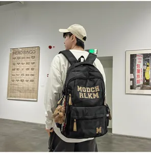 Stylish camouflage student backpack with large capacity, perfect for daily school and outdoor use.