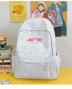 Mochila escolar informal de gran capacidad con bloques de color, elegante y versátil en color gris.