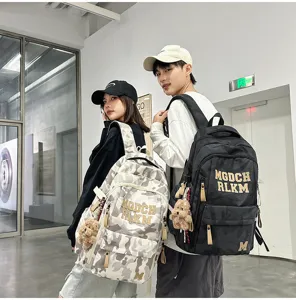 Stylish camouflage large capacity student backpack with contrast color design detail view
