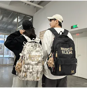 Camouflage school backpack for students, large capacity spine protection casual daypack.