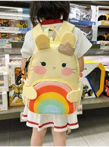 Cute cartoon children backpack with rainbow design, lightweight anti-lost school bag for kids.