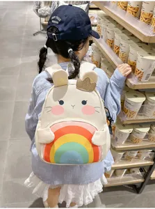 Kids cute cartoon rabbit backpack rear view showing colorful rainbow pocket and soft fabric details.