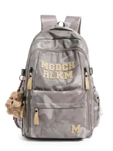 Camouflage large capacity school backpack for students, fashionable spine protection bag