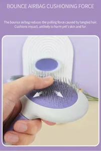 Close-up detail of pet slicker grooming brush featuring bounce airbag cushion and metal pins.