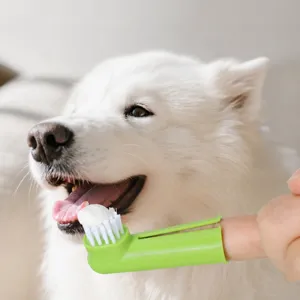 Pet finger toothbrush for dogs and cats, soft silicone dental cleaning tool for pet oral care.