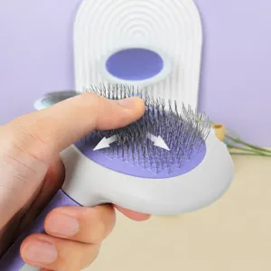 Professional pet slicker brush for dogs and cats, gentle grooming tool with air cushion design.
