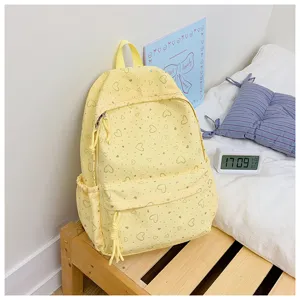 Sac à dos mignon imprimé de cœurs en détail, style japonais grande capacité pour les étudiants.