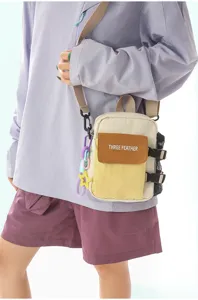 Sac bandoulière tactique bicolore élégant, sac de téléphone portable décontracté pour les trajets.