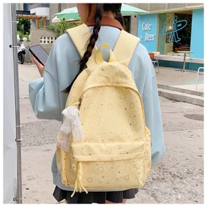 Sac à dos mignon style Harajuku japonais avec imprimé cœur pour étudiants, grande capacité.