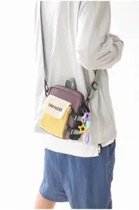 Sac bandoulière téléphone portable colorblock unisexe, sac besace tendance outdoor pour commuter.