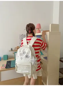 Mochila ita blanca transparente con estrellas y lunares para estudiantes y uso diario.